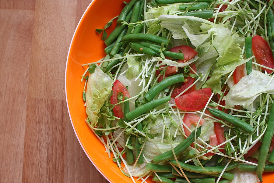 Salad greens, beans, tomatoes, sprouts