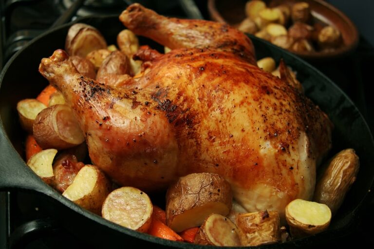 Chicken roasted with potatoes and carrots