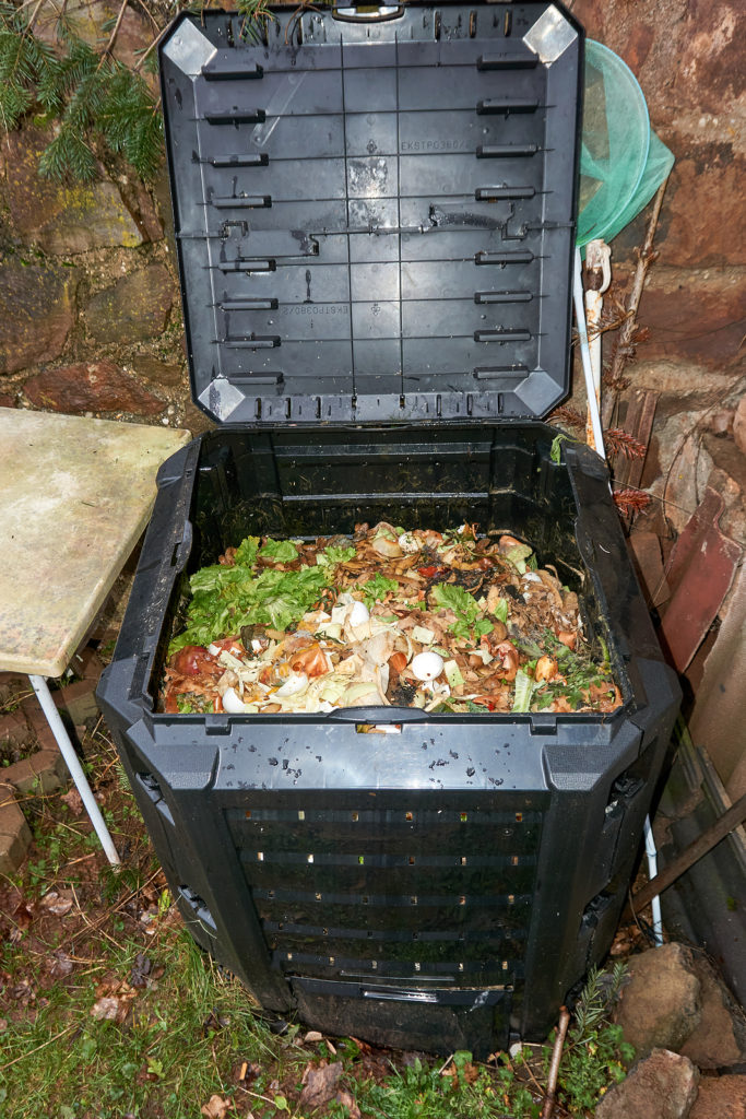 Fresh, organic, garden waste and kitchen scraps in the compost bin
