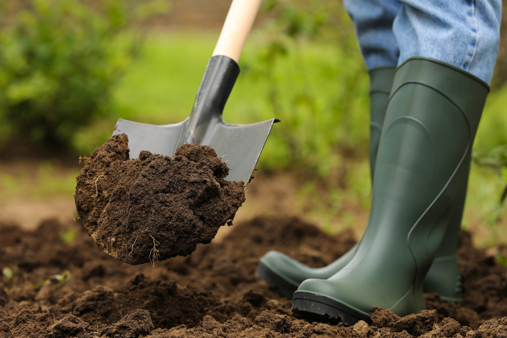 Digging using a round-point shovel